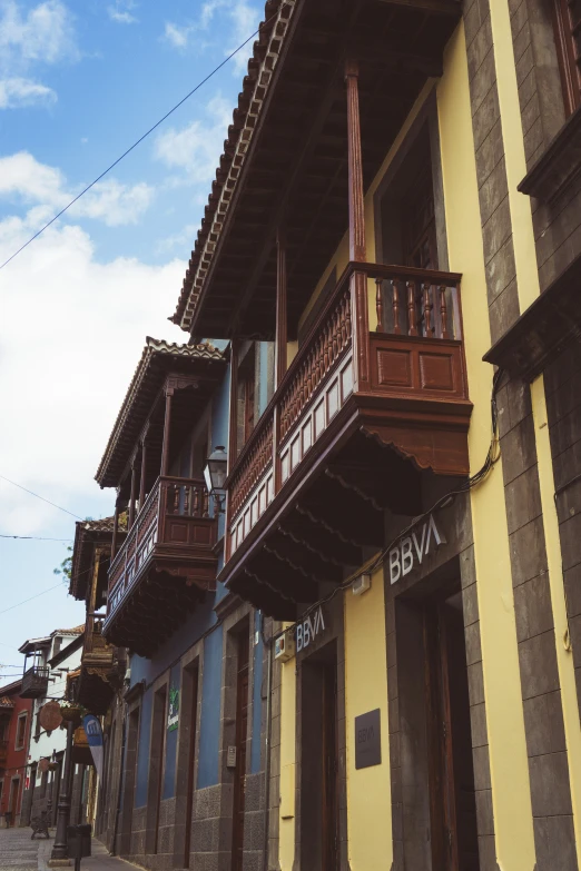 a building with balconys is shown in this color