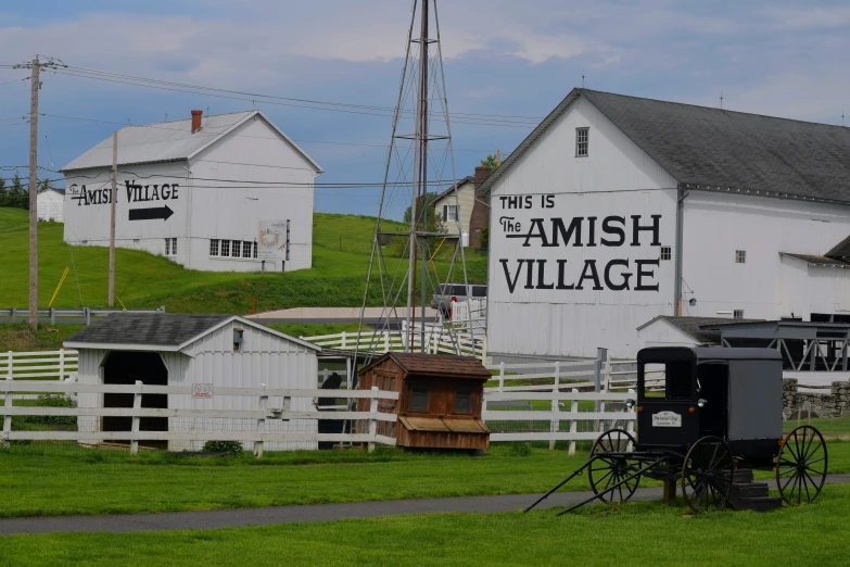 the amish village with horses and buggies is near the farm