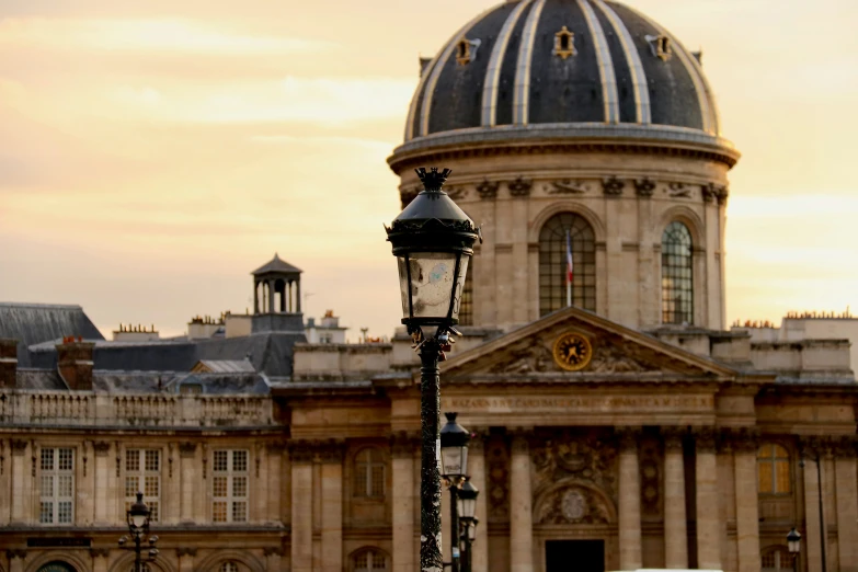 an old building with large domes in the background