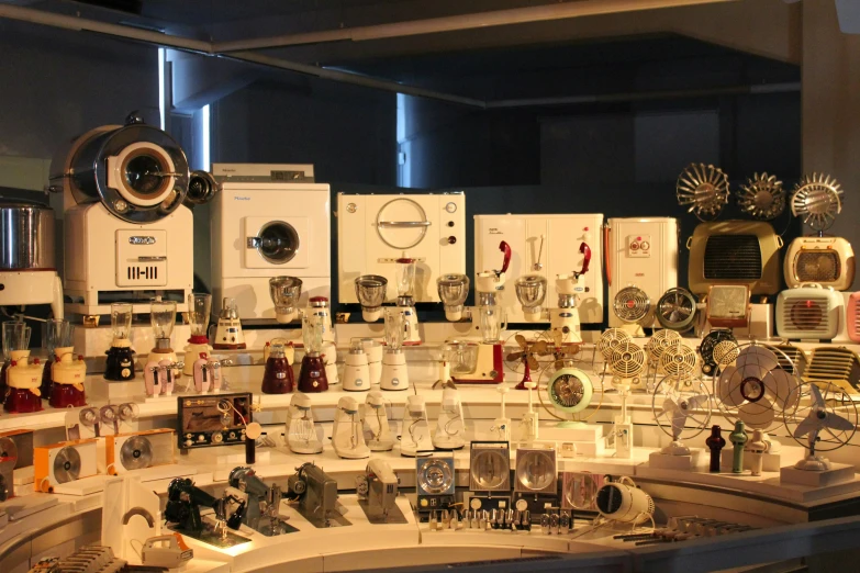 a large number of objects sitting on a counter