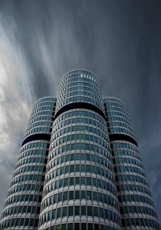 the top part of an office building with windows