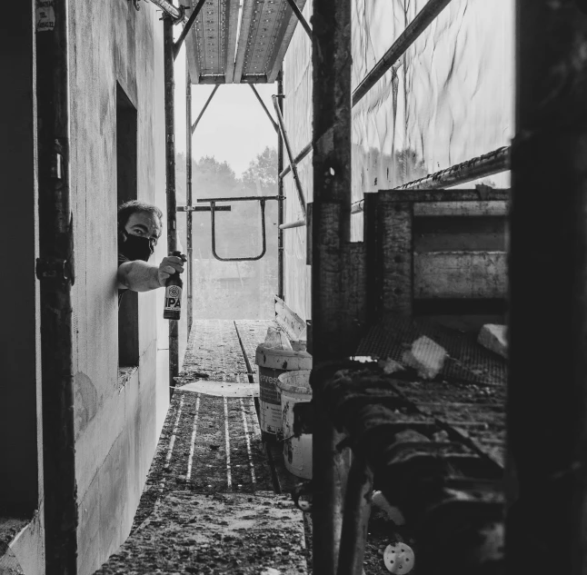 two bunk beds side by side in an empty room