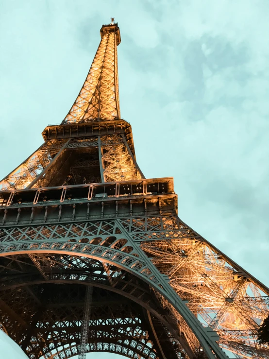 an architectural view of the eiffel tower from below