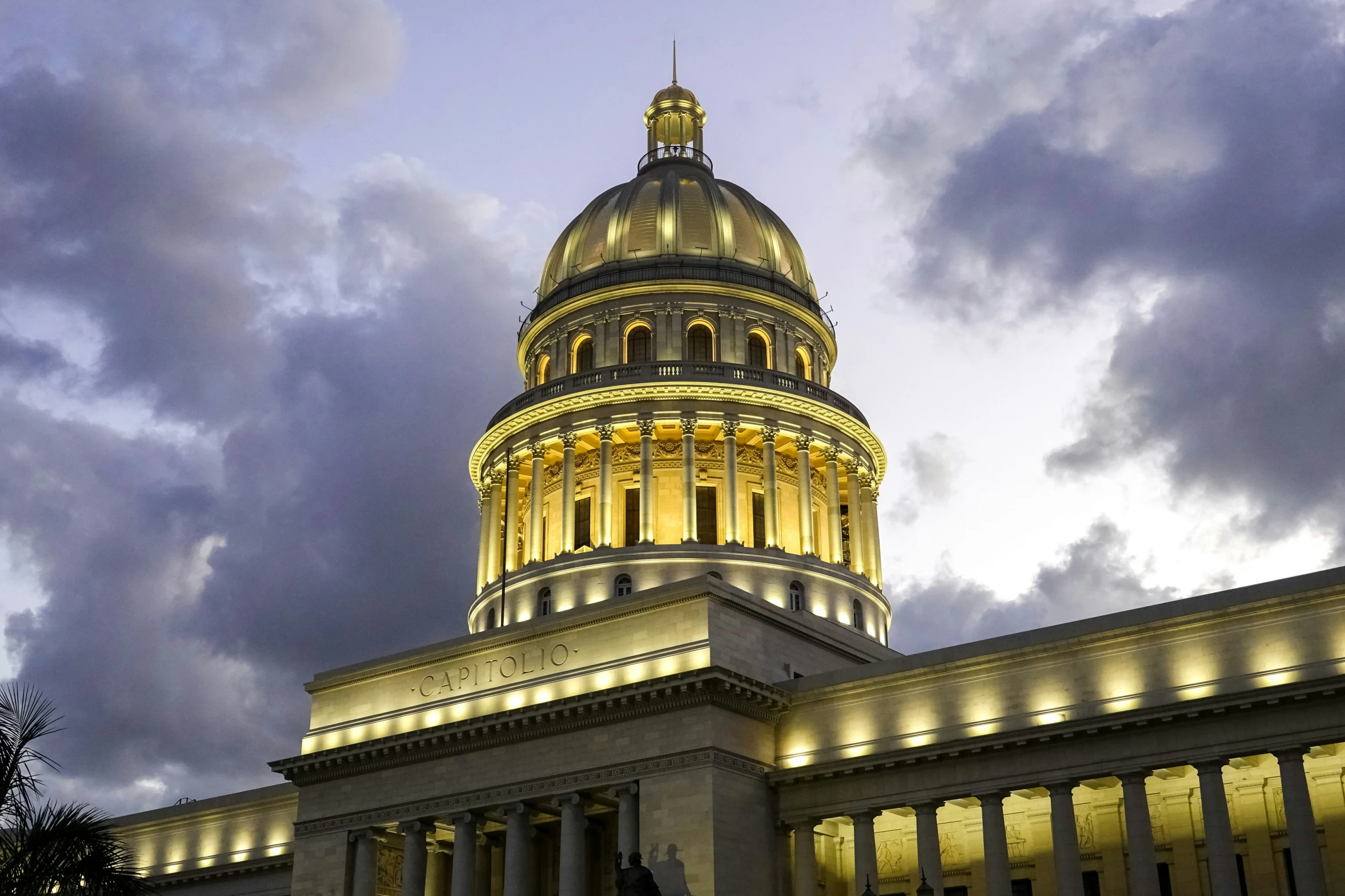 the dome of a building under cloudy skies