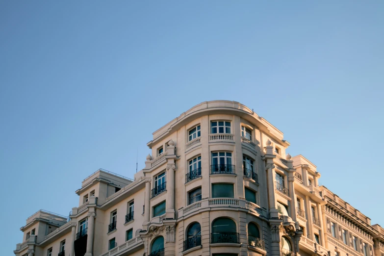 this is a building with many windows and balconies