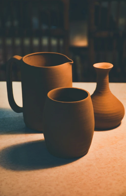 a couple of mugs that are on a table