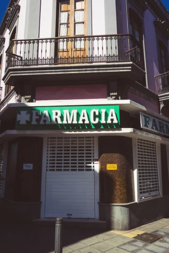 a sign above the doorway for farmacia, one of italy's oldest bars