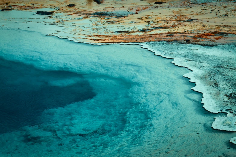 a deep blue lake sitting between two land areas