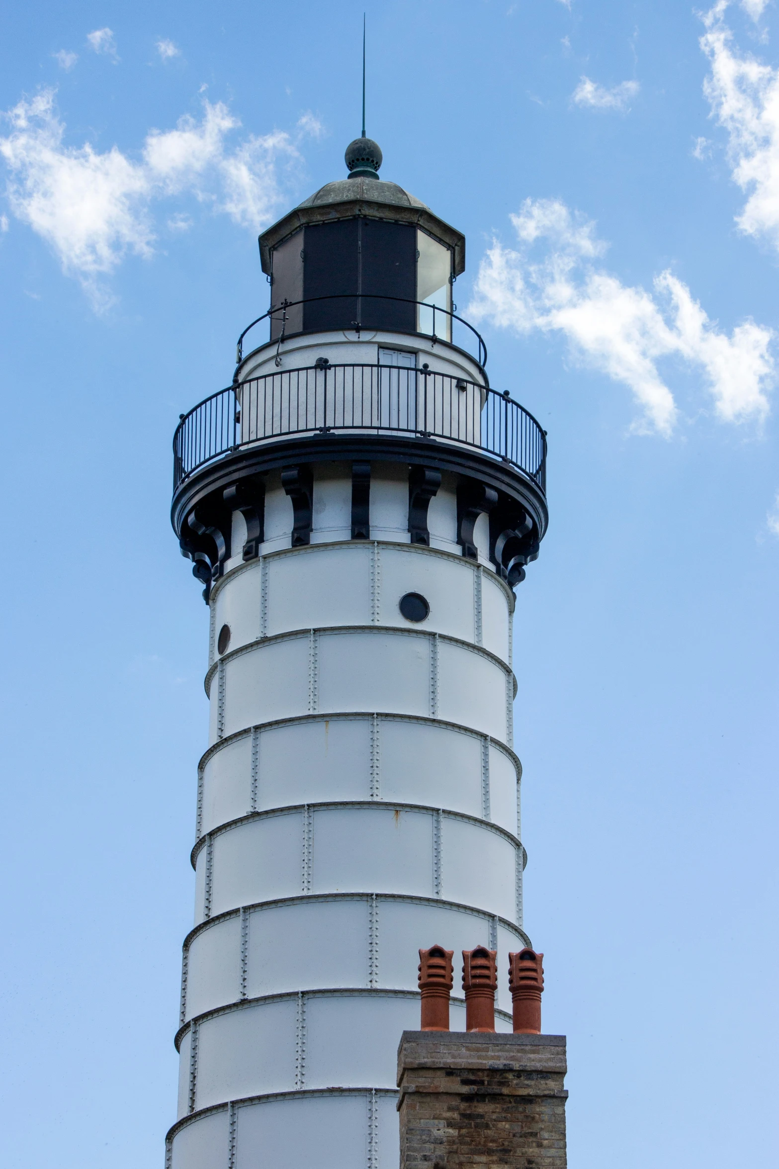 an image of a lighthouse that is overlooking the ocean