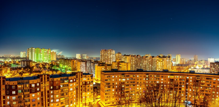 the view from a high rise overlooking city lights