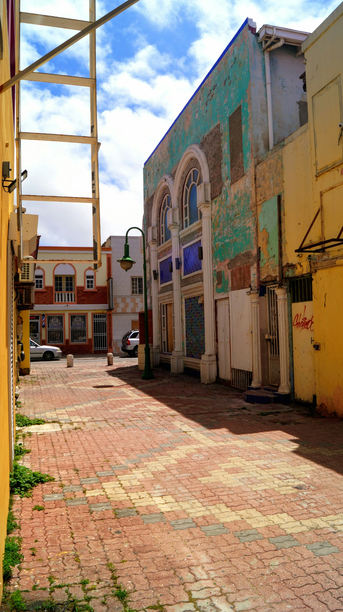 an empty street with some buildings in it