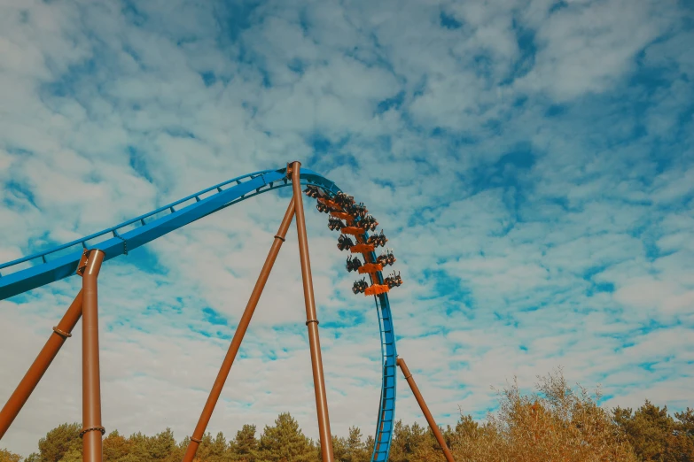 an image of a roller coaster ride going down the hill