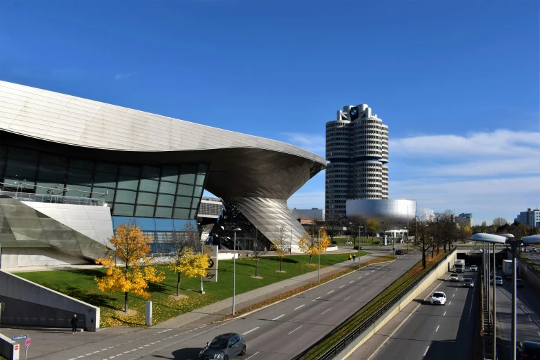 the architecture of a modern building with grass on its roof