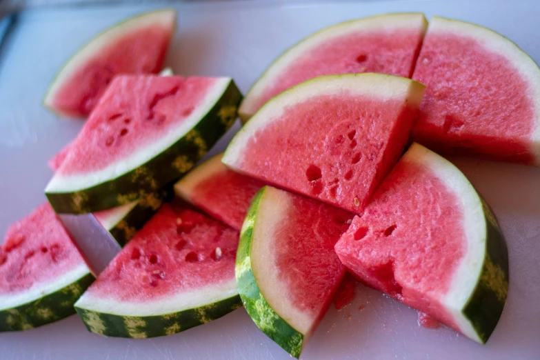 the slices of watermelon are cut up into wedges