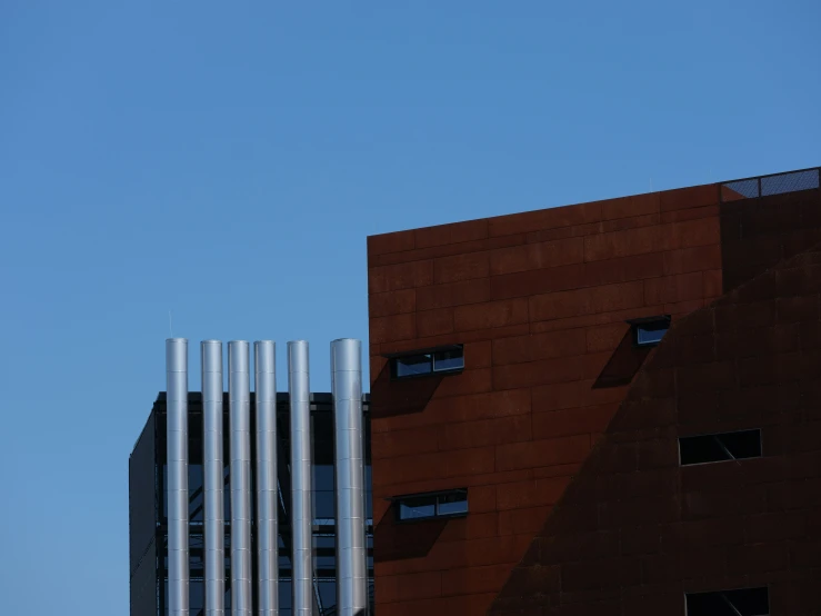 the side of a building in front of blue sky