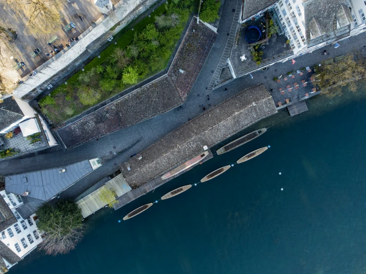 aerial view of water area with boats on shoreline