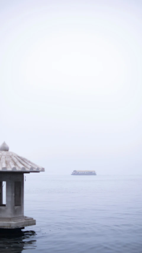 a large boat floating on top of the ocean