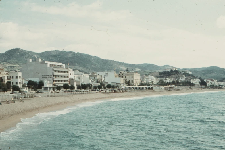 a beach next to some buildings on the beach