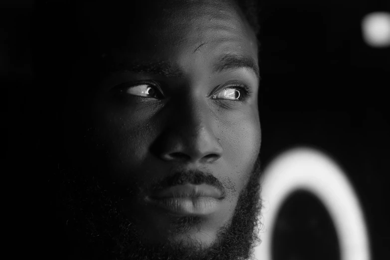 black and white portrait of a man looking at camera