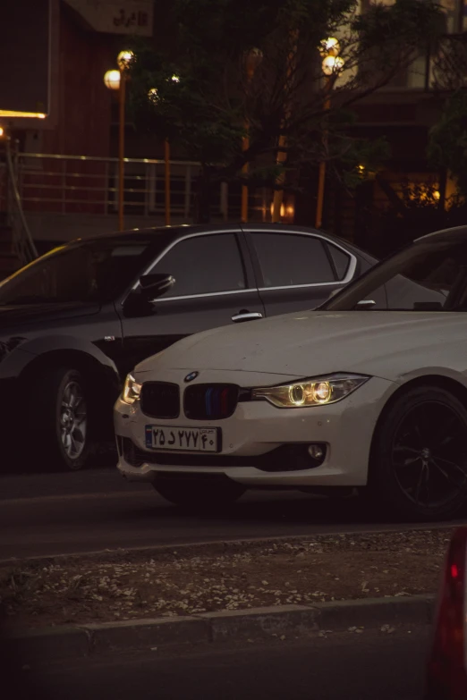 a black and white car parked next to each other