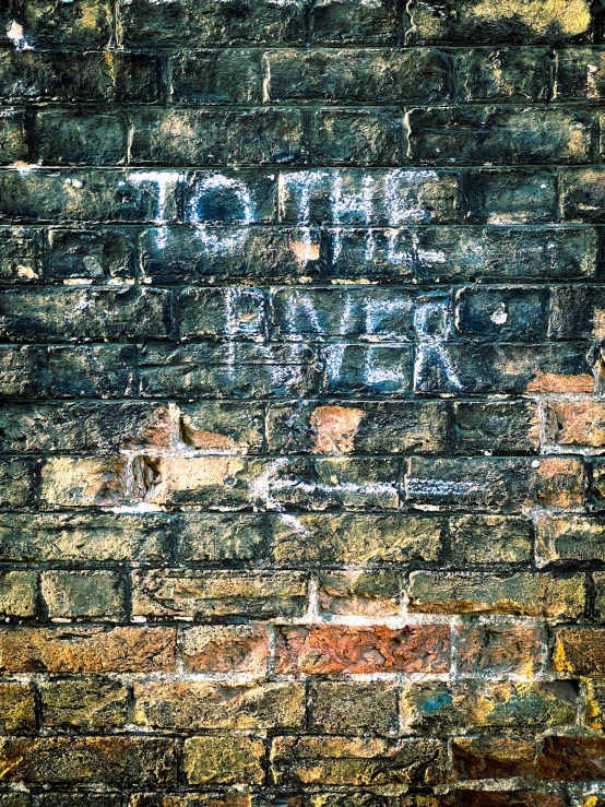 a close up view of the back wall of an old brick building