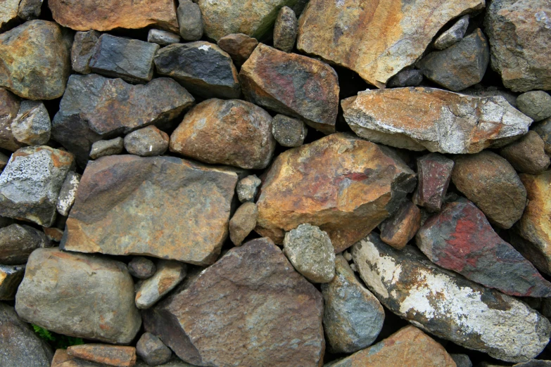 a pile of rocks that are laying on each other