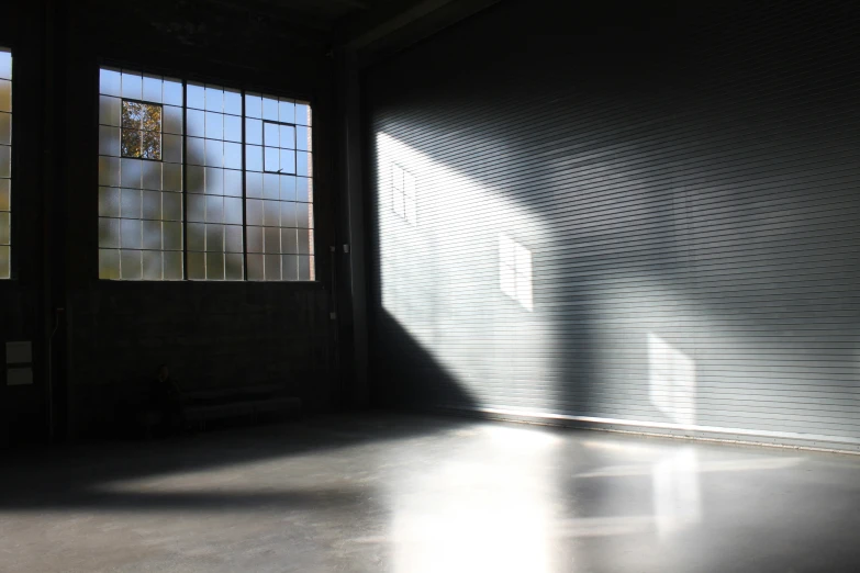 shadows cast on the walls of a room with sliding glass doors