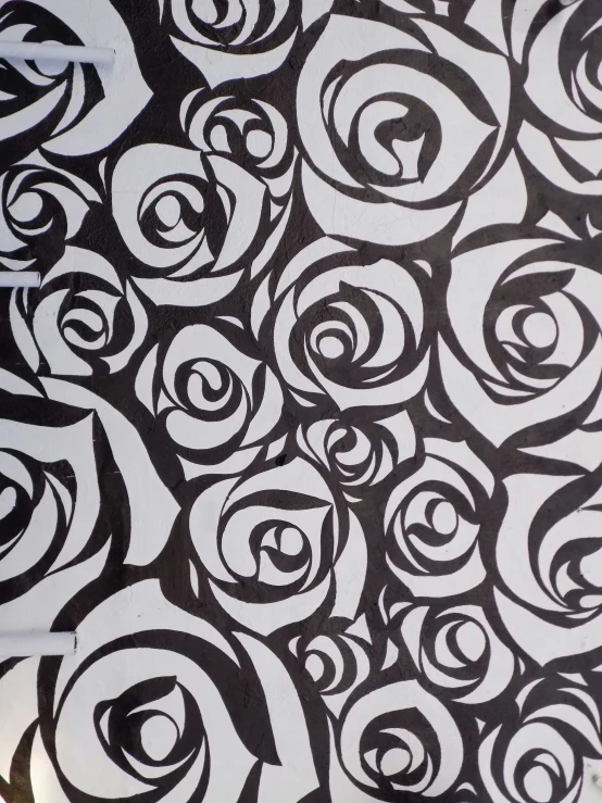 a bunch of black and white designs on white paper