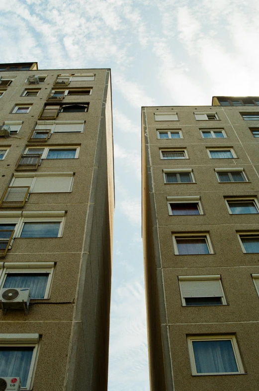 two large building are seen side by side