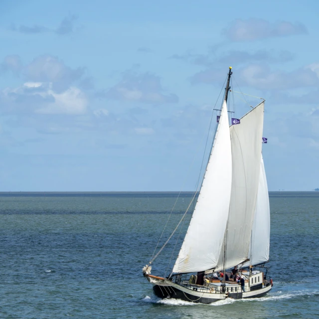 a boat that is sailing on a body of water