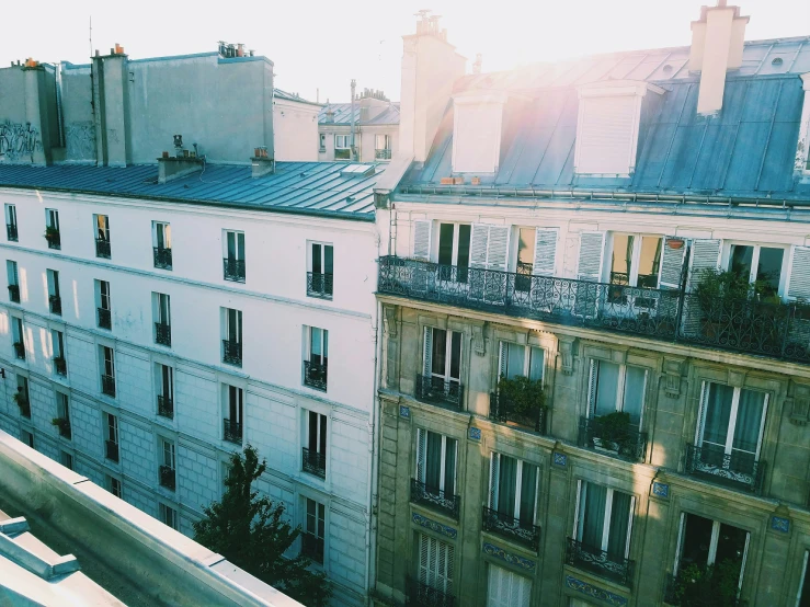 buildings with balconies on either side of them