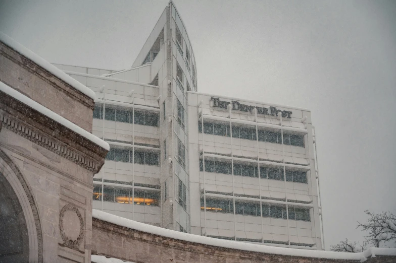 a very tall building sitting in the snow