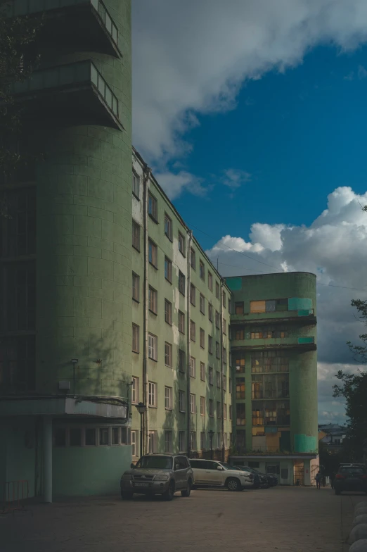 a building that has cars parked outside it