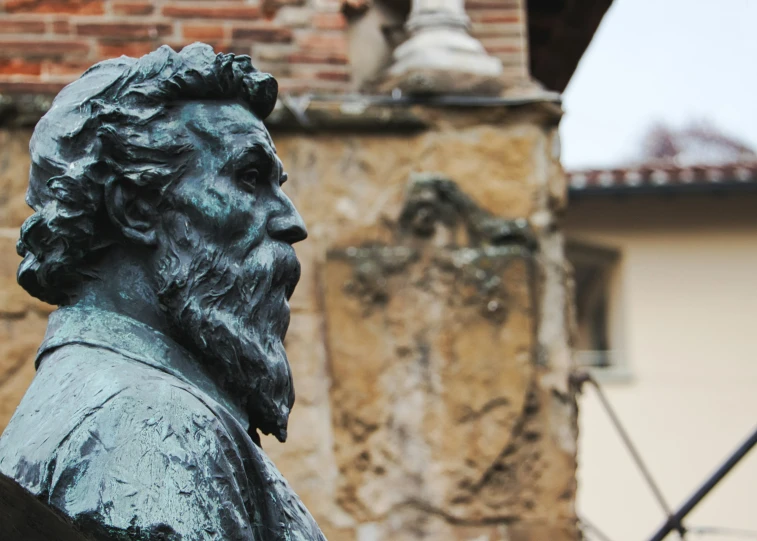 an image of a statue of aham in front of a building