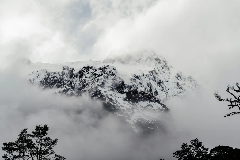 a very tall mountain with a large amount of snow