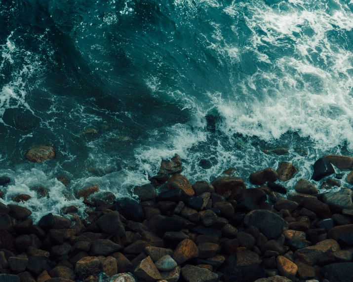 this is the rocks of an ocean and it is covered with waves