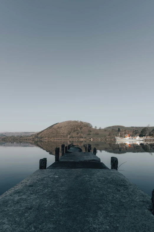 an old po of a pier in the water