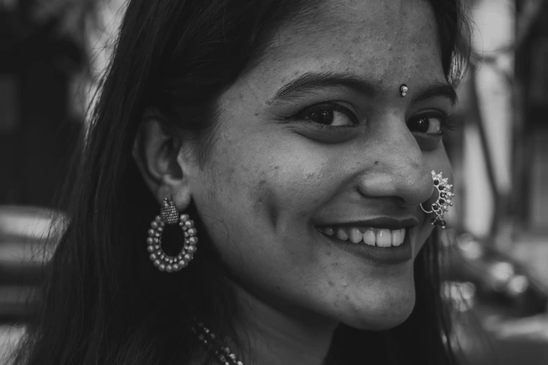 a woman with nose ring and nose jewels