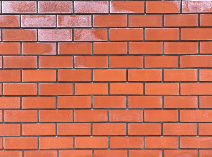 an image of red bricks on a wall