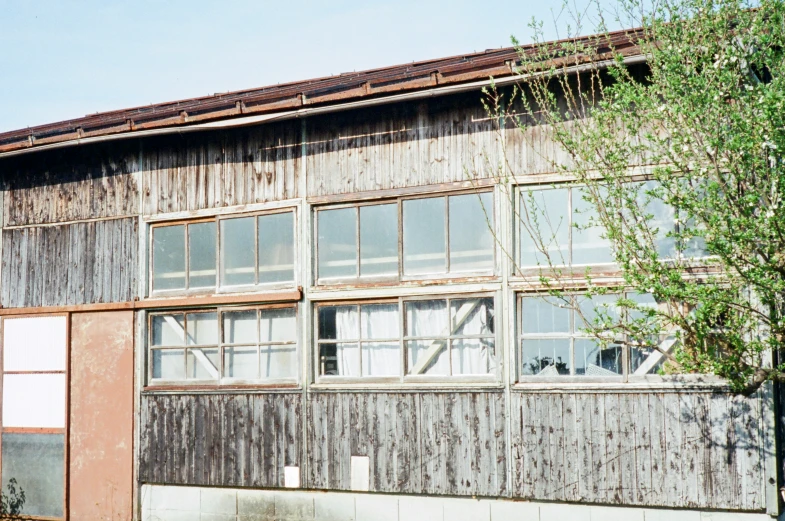 a rusted out old building has windows