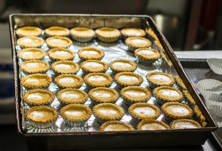 cupcakes on the table ready to go in the oven