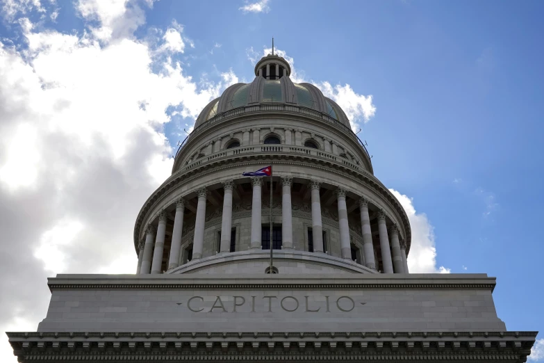 a flag on top of the capitol building