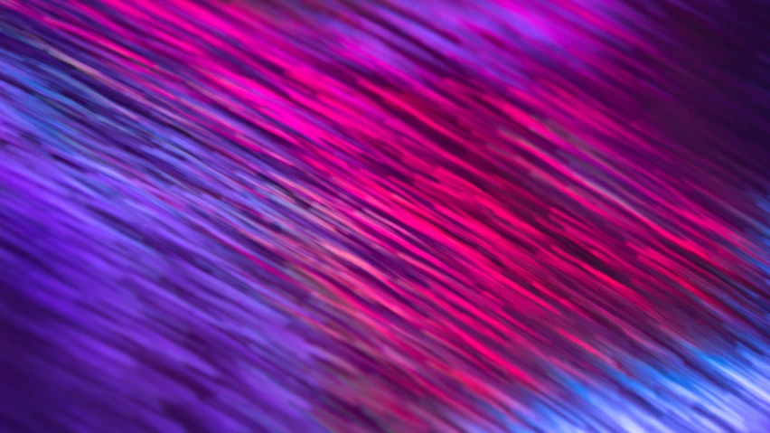 an abstract image of colors in a blurry background