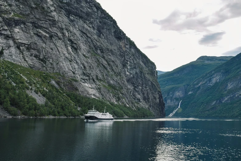 a large boat is out in the open water