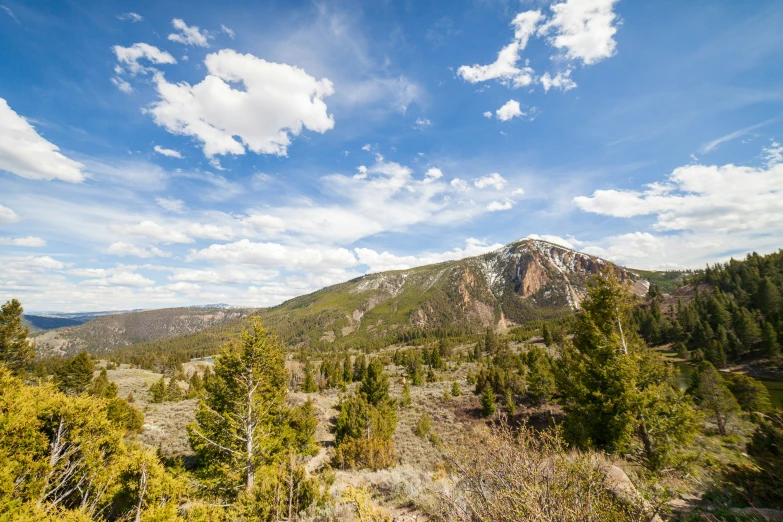 an uplift view of mountains and valleys from a hill