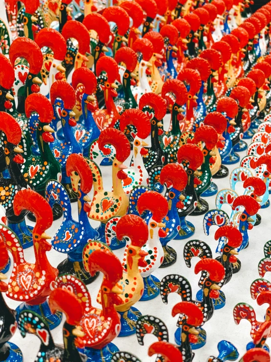 colorful dolls are grouped together in a group