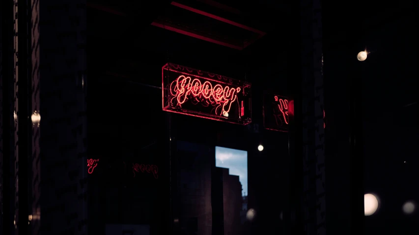 there is a neon sign that says good times and an open door