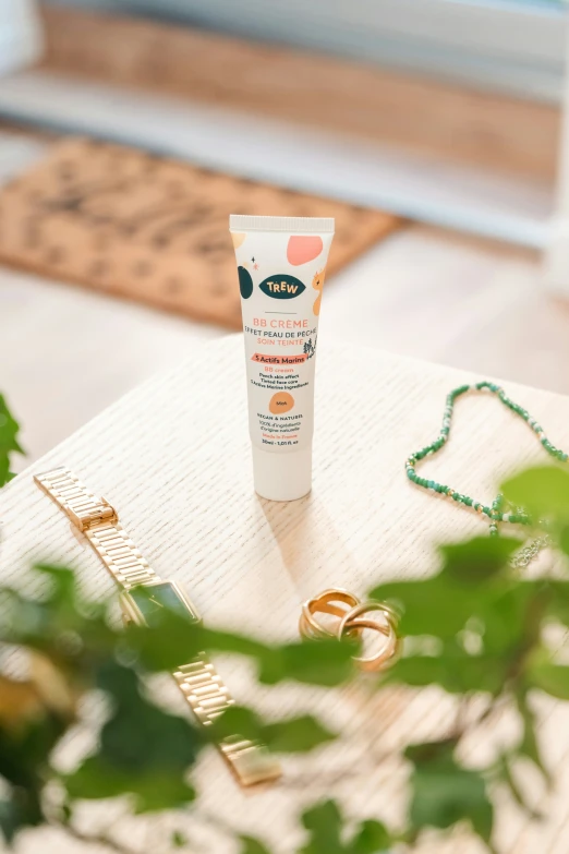 a tube of sunscreen sits on a table