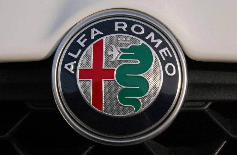 alfa logo on the front grill of an automobile