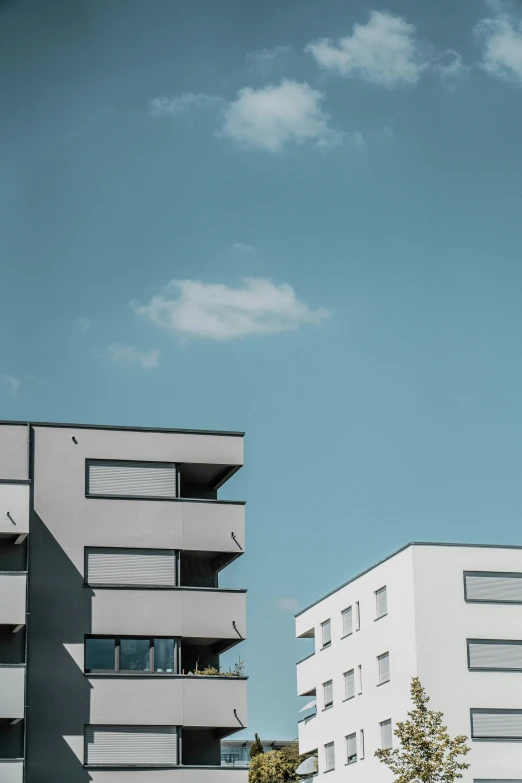 two large white building next to each other